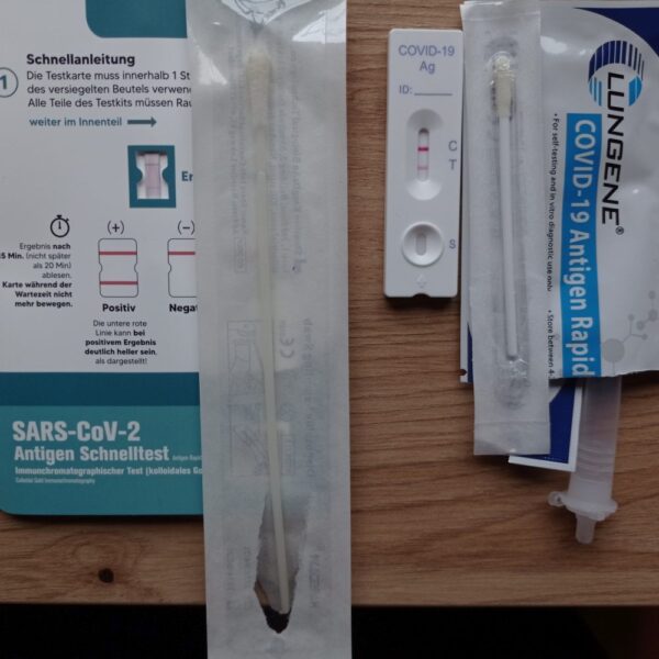 Two Covid-19 rapid self - test kits with positive results. 